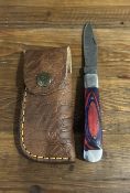 Custom Damascus Steel Folding Pocket Knife with Red/Blue Wood Handle & Leather Sheath
