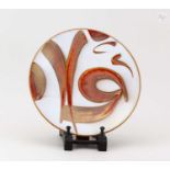 † ALAN CAIGER-SMITH (1930-2020) for Aldermaston Pottery; a tin glazed earthenware plate/wall hanging