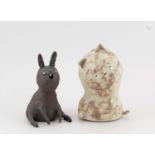 MASAZUMI YAMAZAKI; 'Pensive Cat', an earthenware sculpture covered in pale green slip with iron