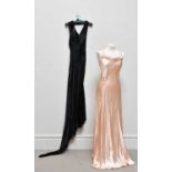 An original 1930s full length patterned silk velvet evening gown, with long train, detailed neckline