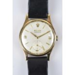 ROLEX; a gentleman's 9ct gold Precision wristwatch, the dial set with Arabic numerals and batons,