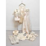 A Victorian late 19th century cream satin long skirt, a blouse top with lace embellishment to
