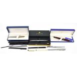 WATERMAN; a fountain pen with amber coloured body and cap, in box, with a Waterman stainless steel