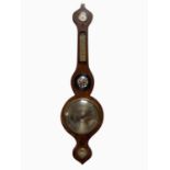 J HUGHES & CO, CARNARVON; a 19th century mahogany wheel barometer, with silvered dial, length 93cm.