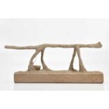 IN THE STYLE OF ALBERTO GIACOMETTI; a concrete sculpture, 'The Cat', signed 'SF', height 20cm,
