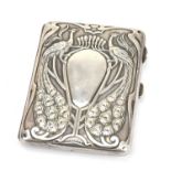 HENRY MATTHEWS; an Edward VII hallmarked silver Art Nouveau note memoire, embossed with peacocks