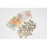 A collection of half silver shillings, florins and other coins, 1920-1946, weight 335g, with a small