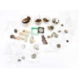 A small collection of assorted coins, including Elizabeth II sixpence pieces, two shillings, a