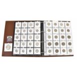 A collection of crowns, sixpences, half crowns and shillings of various dates, including a William