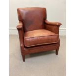 A modern tan leather library chair, on tapered legs, height 76cm.