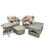 MARSTON & LANGINGER; a conservatory table, height 49cm, length 102cm, width 62cm, with a pair of tub