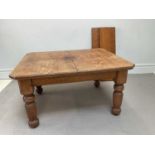 A late Victorian oak wind-out extending dining table, with two additional leaves, on fluted column