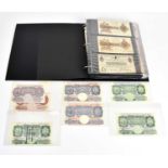 THE BANK OF ENGLAND; a large collection of George V and later bank notes, comprising five George and