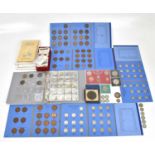 A collection of British coins, to include an 1892 silver crown, with a selection of cigarette cards,