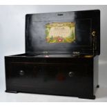 An early 19th century inlaid rosewood music box, playing eight airs, with label to inner lid '