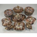 COALPORT c.1800-1810; a part dinner service comprising an oval platter, tureens, dinner plates, etc.