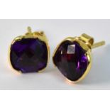A pair of 18ct yellow gold amethyst set stud earrings, total 4.3g.