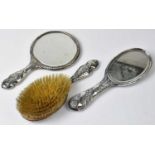 Three late 19th early 20th century hallmarked silver dressing table items, comprising two hand
