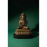 RARE CENTRAL TIBETAN SEATED FIGURE OF KUNZANG AKOR, BON DEITY