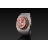 ROMAN RED JASPER INTAGLIO OF A CORNUCOPIA, WHEAT STALKS AND A GRASSHOPPER IN SILVER RING