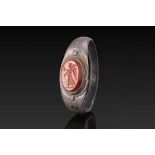 ROMAN CARNELIAN INTAGLIO OF WINGED VICTORY WITH BRANCH AND WREATH IN SILVER RING