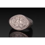 BYZANTINE SILVER RING WITH CROSS FLANKED BY VEGETAL TENDRILS