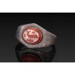 ROMAN CARNELIAN INTAGLIO OF SEA CREATURES IN SILVER RING