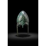 GREEK CHALCIDIAN TINNED BRONZE HELMET WITH CHEEK PIECES