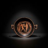 GREEK RED-FIGURE KYLIX WITH ATHLETES