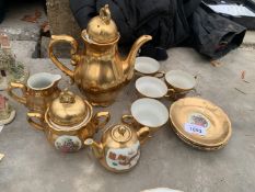 A BAVARIAN GOLD TEASET TO INCLUDE 4 CUPS AND SAUCERS, TEAPOT, MILK JUG AND SUGAR BOWL