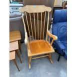 A FARMHOUSE STYLE ROCKING CHAIR