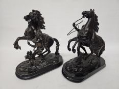 A PAIR OF SPELTER SCULPTURES OF REARING MARLEY HORSE STALLIONS AFTER GUILLAUME COUSTEAU - 24 CM (H)