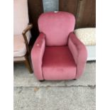 A CHILDS SIZE UPHOLSTERED EASY CHAIR