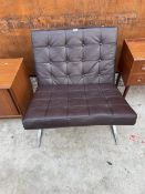 A BARCELONA CHAIR ON POLISHED CHROME X FRAME WITH BUTTONED LEATHER SEAT AND BACK