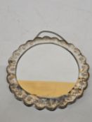 A SILVER CIRCULAR CONTINENTAL OTTOMAN PERIOD REPOUSSE-BACKED MIRROR MARKED 900 - 21 CM (D)