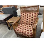 A FAUX BAMBOO AND RATTAN EASY CHAIR AND TABLE