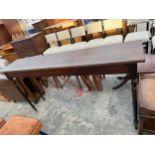 A TALL MAHOGANY SIDE TABLE ON TURNED LEGS, 72" WIDE