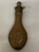 A COPPER AND BRASS POWDER FLASK FEATURING THE "PHARAOH'S HORSES" EMBOSSED DESIGN