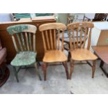 A PAIR OF VICTORIAN ELM AND BEECH KITCHEN CHAIRS AND SIMILAR PAINTED CHAIR STMPED J.H.