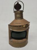 A VINTAGE COPPER SHIP'S STARBOARD LANTERN WITH A FRESNEL-STYLE GREEN GLASS LENS