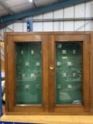 A VINTAGE OAK KEY CABINET NUMBERED 1 - 33 COMPLETE WITH KEY AND WALL FIXING ATTACHMENTS (HEIGHT