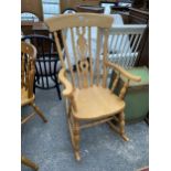 A VICTORIAN STYLE ROCKING CHAIR