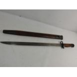 A WORLD WAR I 1907 PATTERN BAYONET AND SCABBARD, 43.5CM BLADE STAMPED WILKINSON WITH VARIOUS PROOF