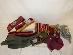 A COLLECTION OF ASSORTED MILITARY BELTS, TO INCLUDE ROYAL ENGINEERS, ROYAL ARMY MEDICAL CORPS ETC.
