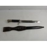 A NAZI GERMANY WORLD WAR II KS98 WALKING OUT BAYONET AND SCABBARD, 34CM CHROMED BLADE STAMPED C.