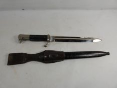 A NAZI GERMANY WORLD WAR II KS98 WALKING OUT BAYONET AND SCABBARD, 34CM CHROMED BLADE STAMPED C.