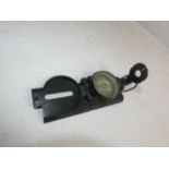 A GREEN PAINTED MILITARY TYPE MAP READING ORIENTEERING COMPASS