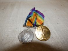 A WORLD WAR I MEDAL PAIR AWARDED TO 117001 ACTING SERGEANT A.J. WEST ROYAL ARTILLERY