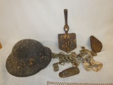 A COLLECTION OF WORLD WAR I BATTLEFIELD RELIC ITEMS, TO INCLUDE STEEL HELMET, SNIPERS SHIELD,