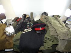 A LARGE COLLECTION OF UNIFORMS AND EQUIPMENT WHICH BELONGED TO LIEUTENANT COLONEL RUSSELL OF THE 1ST